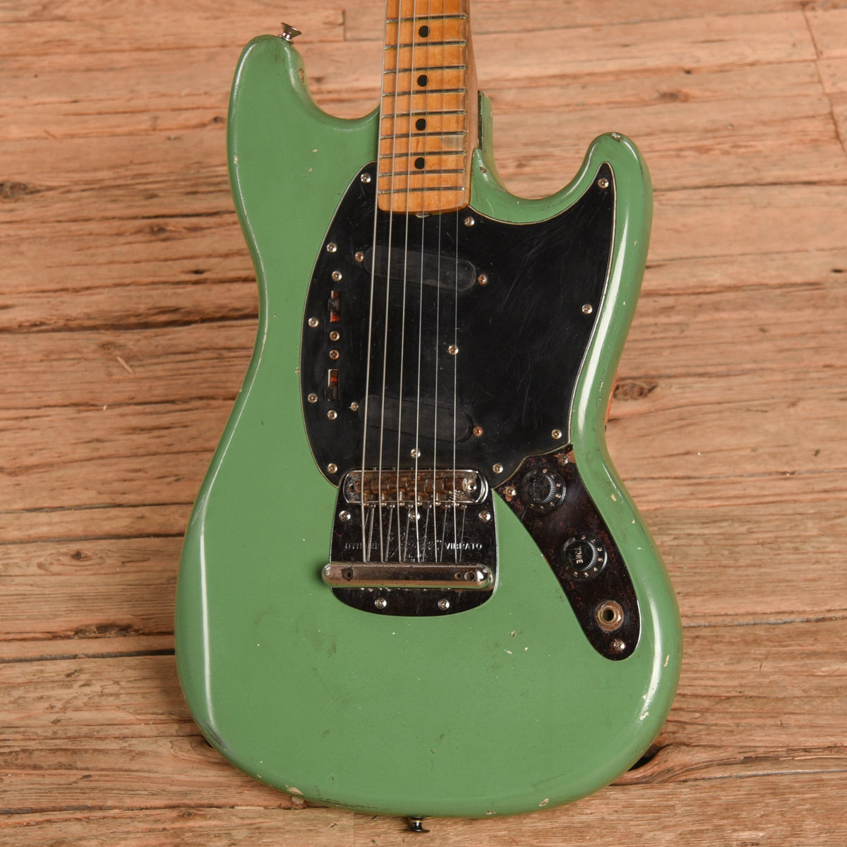 Fender Mustang Green Refin 1977 - Angle 2 | MUSICTONER