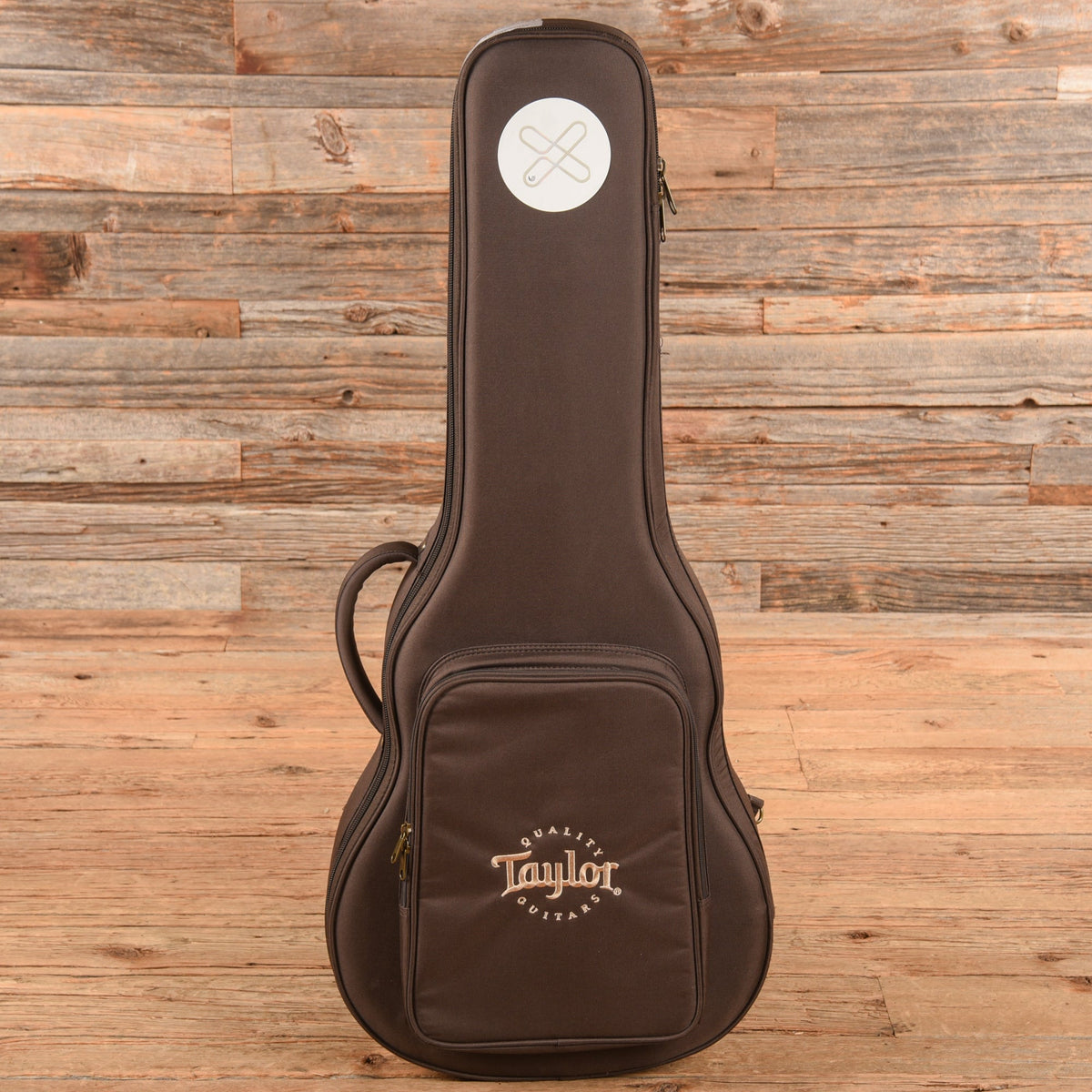 Taylor GTe Mahogany Natural - John Oates - Angle 8 | MUSICTONER